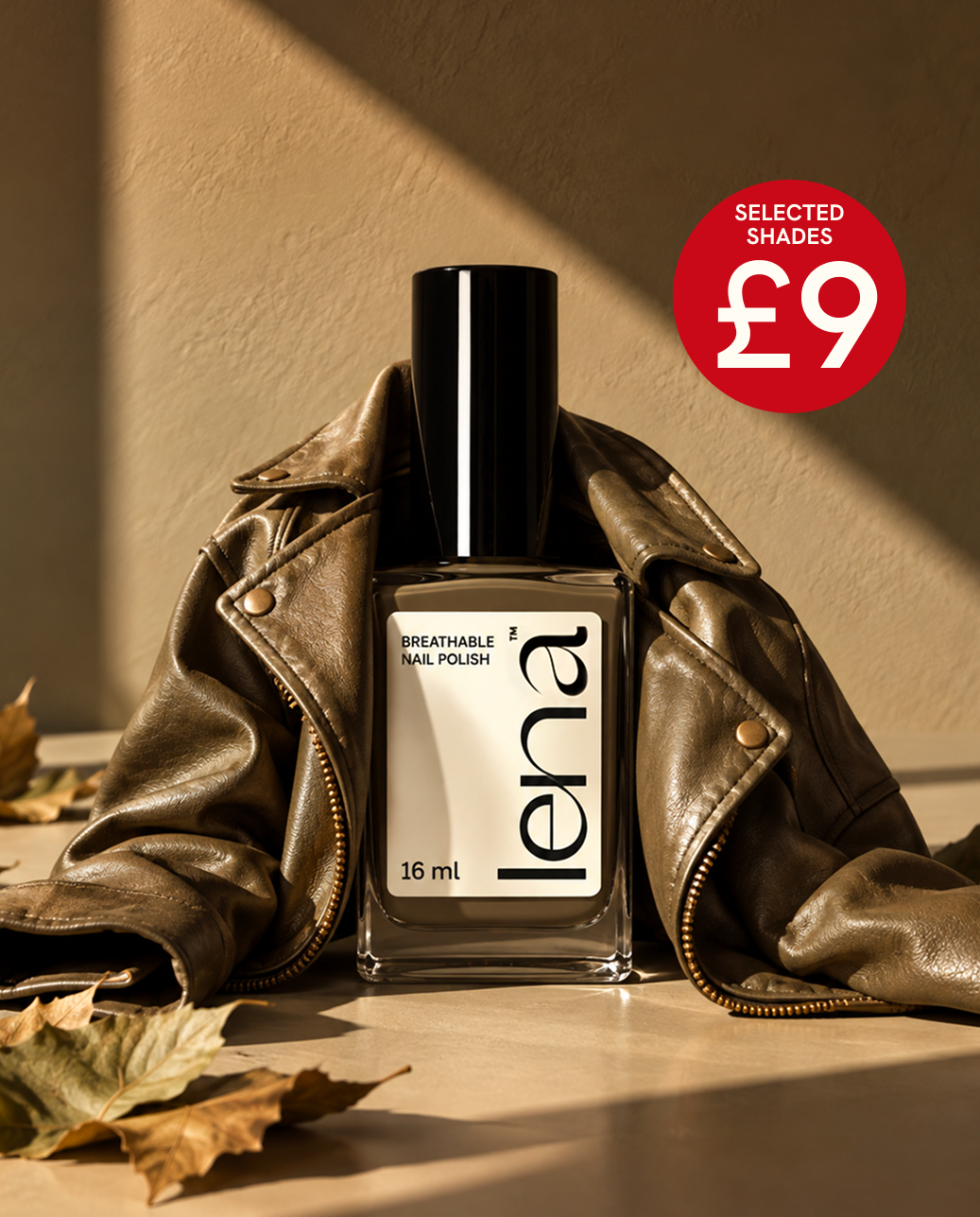A bottle of Lena nail polish in a clear glass bottle with a black cap, styled in front of a brown leather jacket on a warm beige surface with dried leaves. A red circular badge in the top right reads 'SELECTED SHADES £9'.